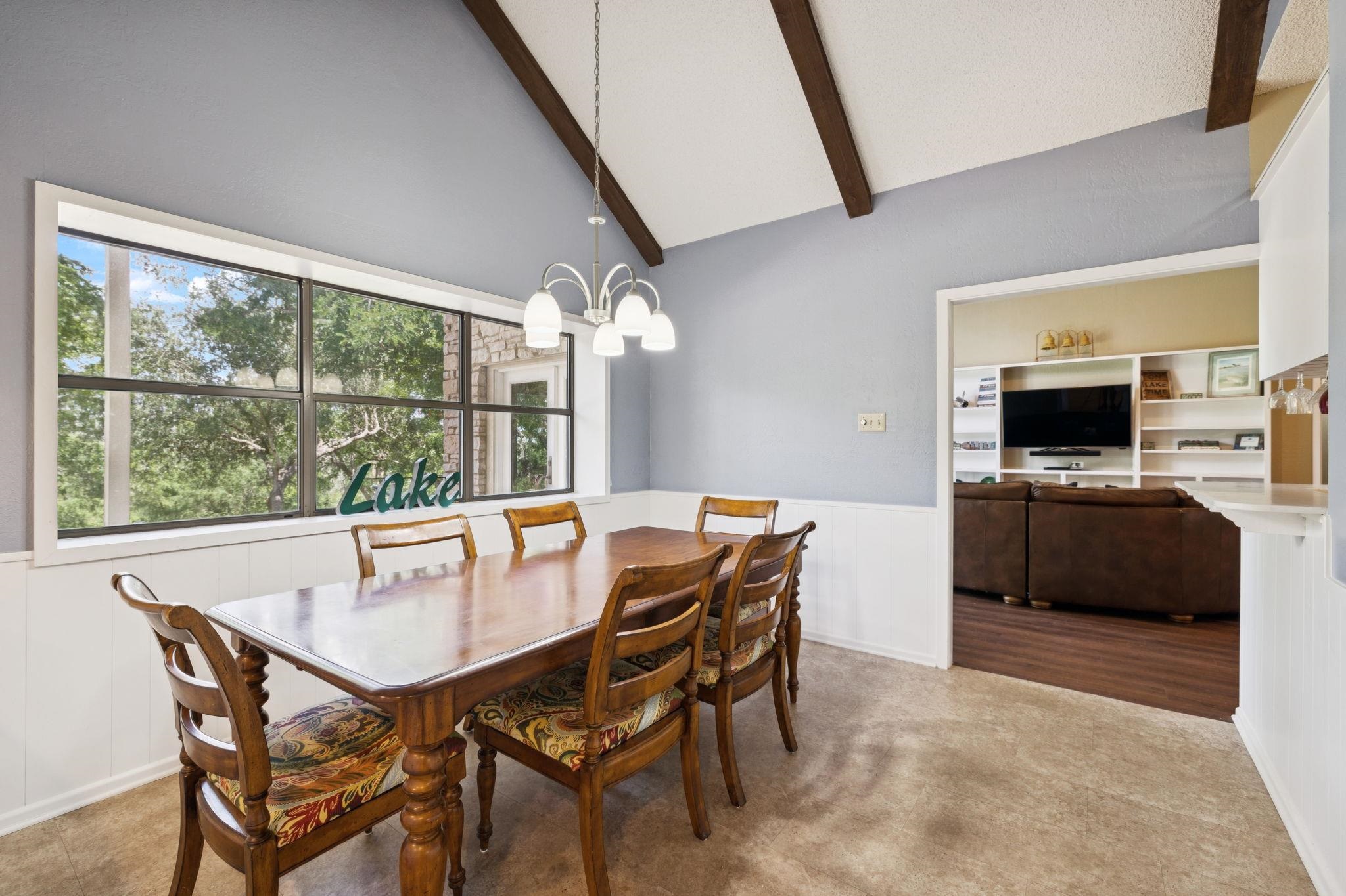 180 Wampum Way Seguin, TX 78155 - Photo 21 of 24 a view of a dining room with furniture and a window