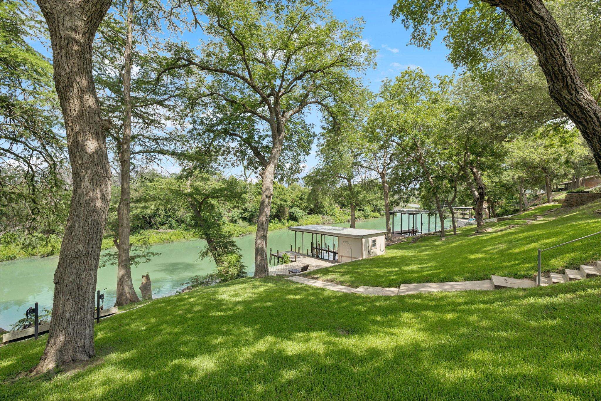 180 Wampum Way Seguin, TX 78155 - Photo 5 of 24 a view of a park with large trees