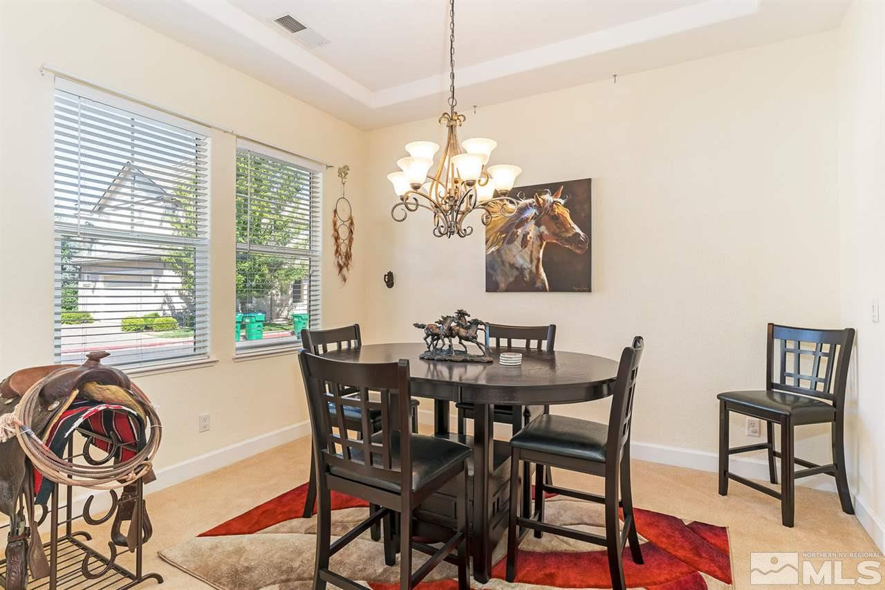 1644 Sawtooth Trail Reno, NV 89523 - Photo 3 of 15 a view of a dining room with furniture and chandelier