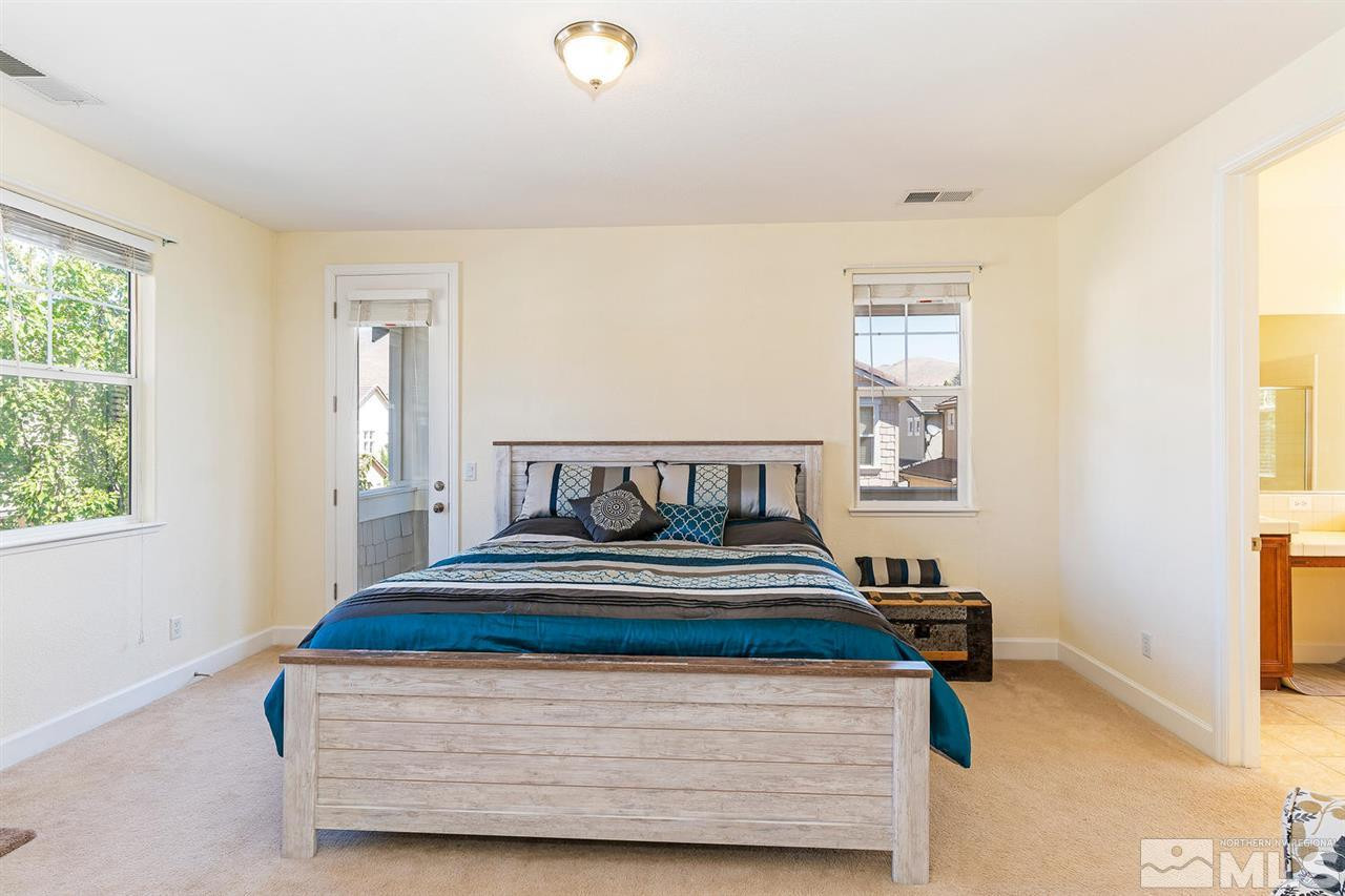 1644 Sawtooth Trail Reno, NV 89523 - Photo 9 of 15 a bedroom with bed and window