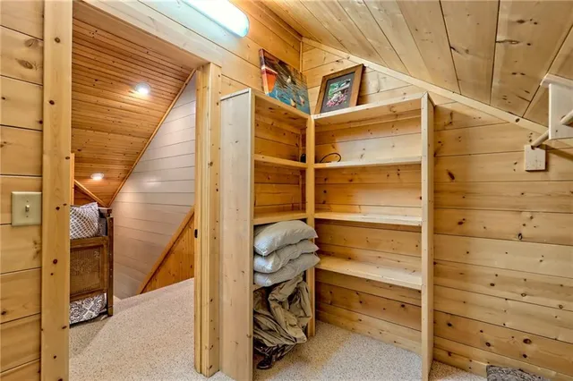 a bed room with a bed and a window