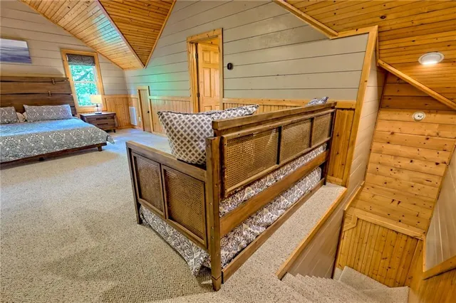 a bedroom with furniture and a window