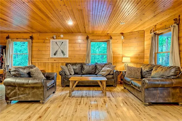 a dining room with furniture and a fireplace