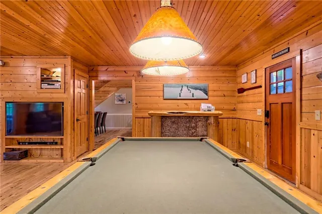 a view of a chairs and table in patio