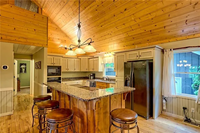 a view of a chair and table in the balcony