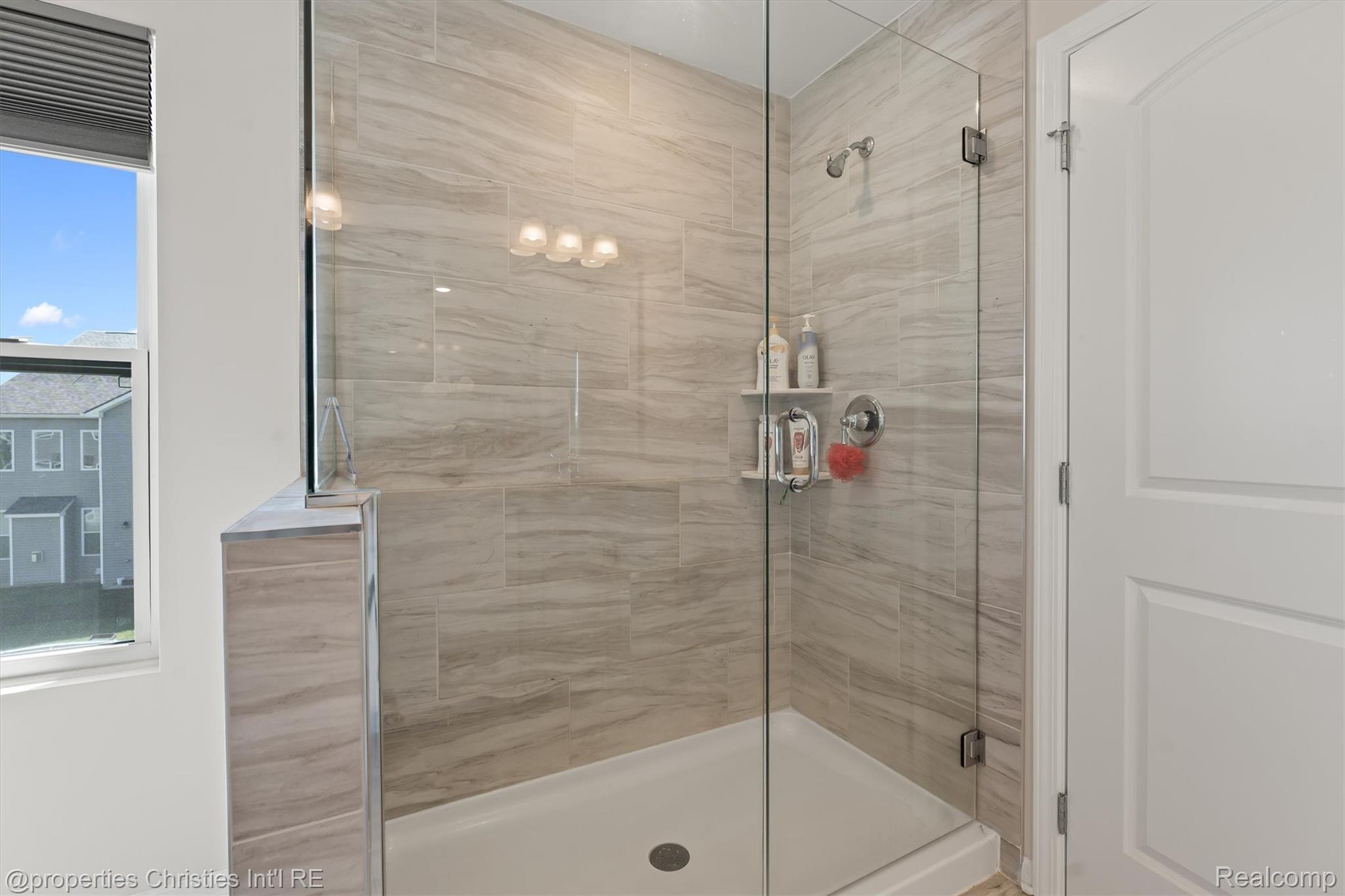 2721 Maize Loop Saline, MI 48176 - Photo 20 of 52 Full bath featuring a shower stall