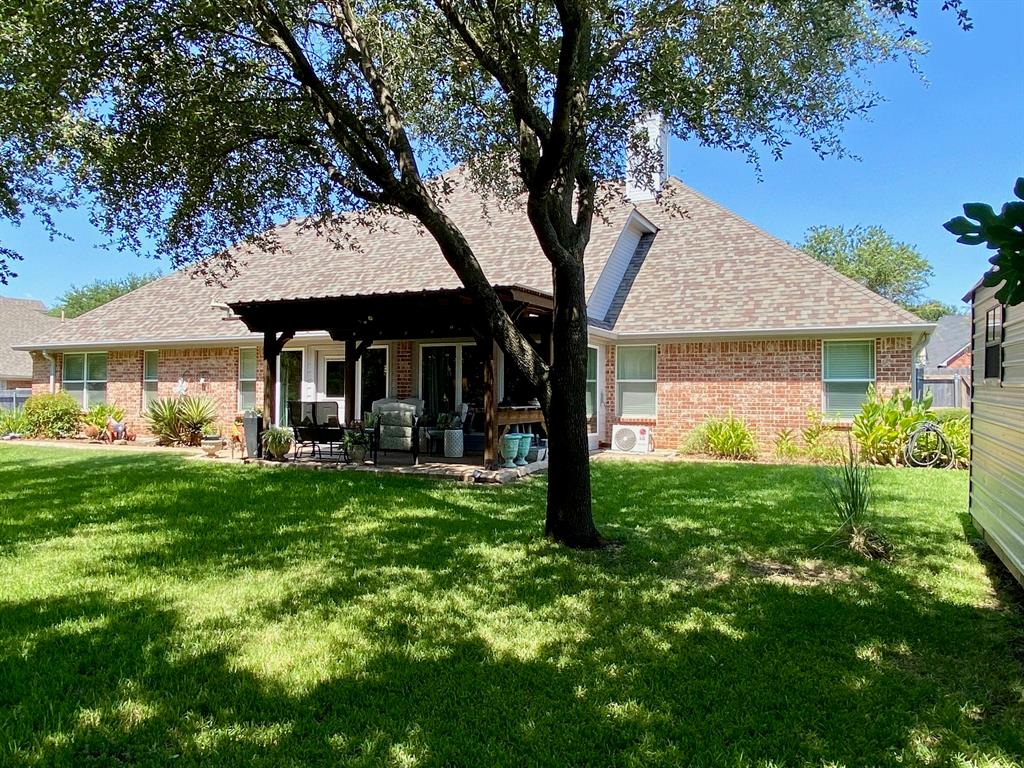210 Ranchgate Trail Waco, TX 76657 - Photo 27 of 31 Rear Elevation showing Back Patio and Pergola