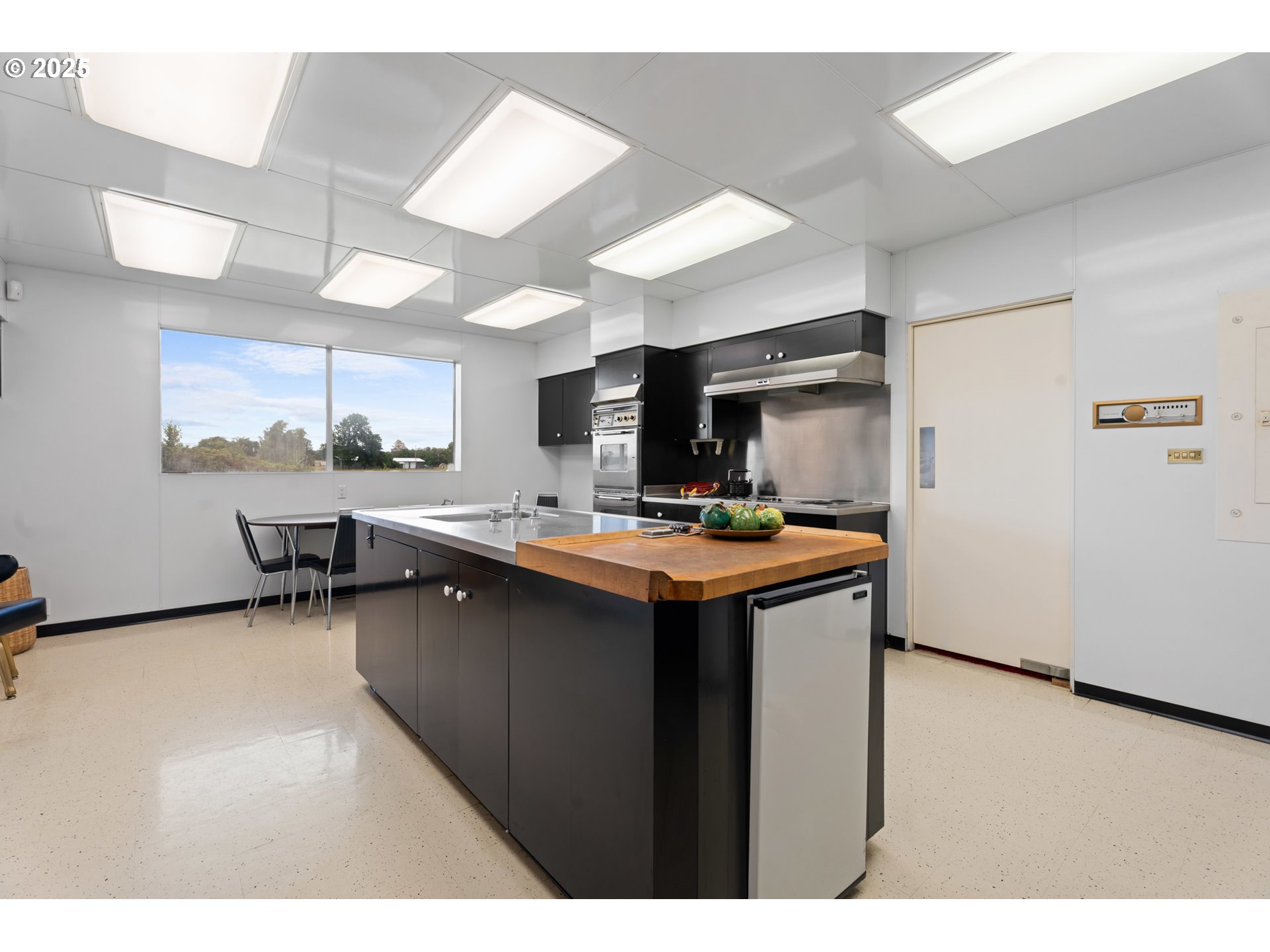 53767 East Honeyman Road Scappoose, OR 97056 - Photo 20 of 46 a kitchen with a sink and cabinets