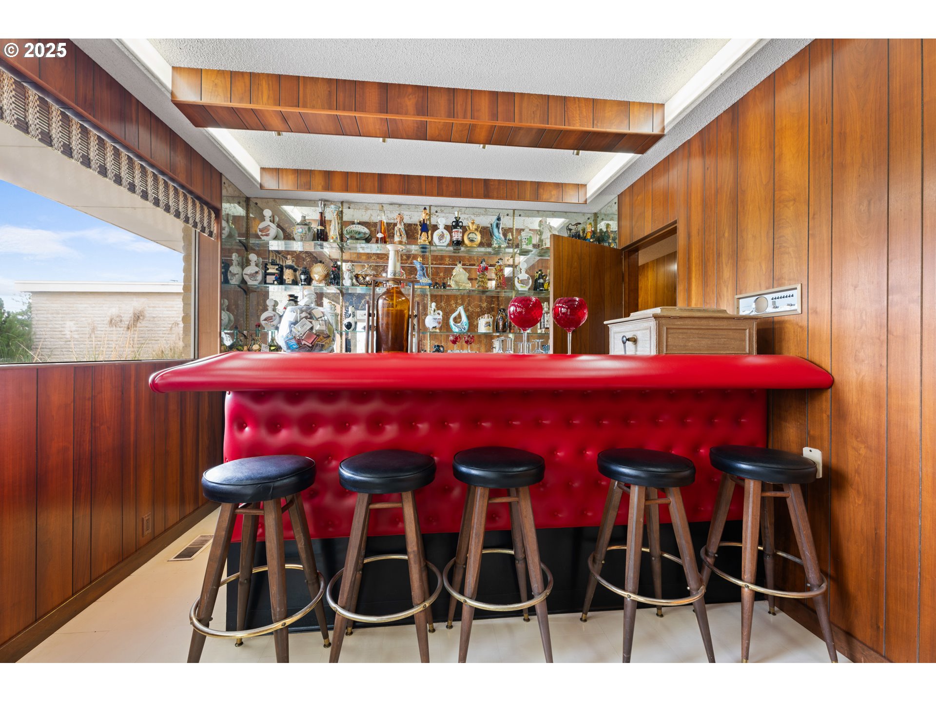 53767 East Honeyman Road Scappoose, OR 97056 - Photo 25 of 46 a view of a dining room with furniture and chandelier