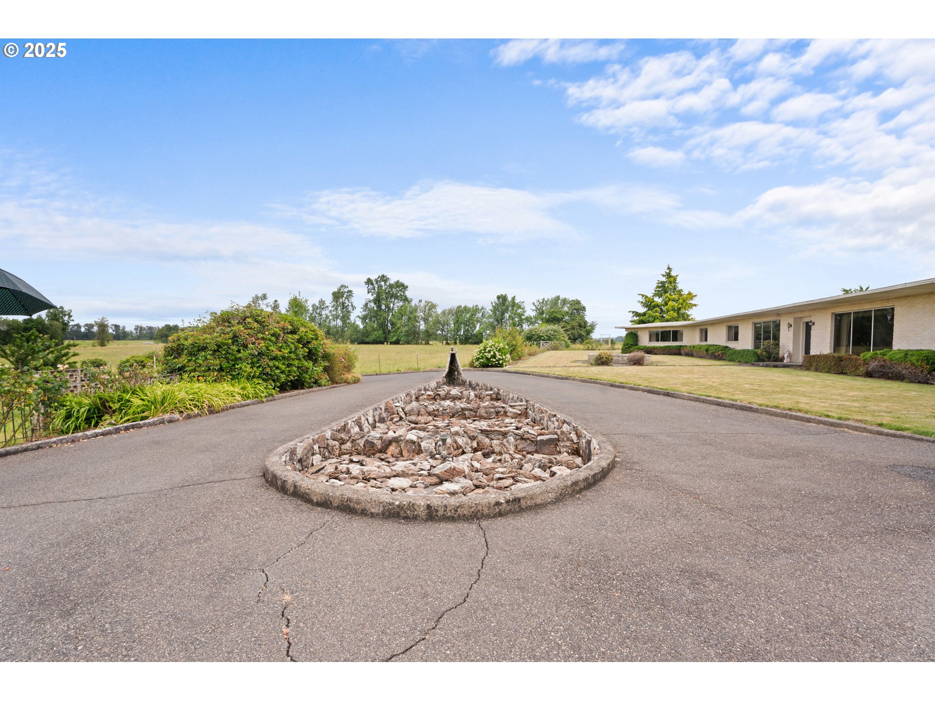 53767 East Honeyman Road Scappoose, OR 97056 - Photo 26 of 46 a view of a swimming pool with a yard