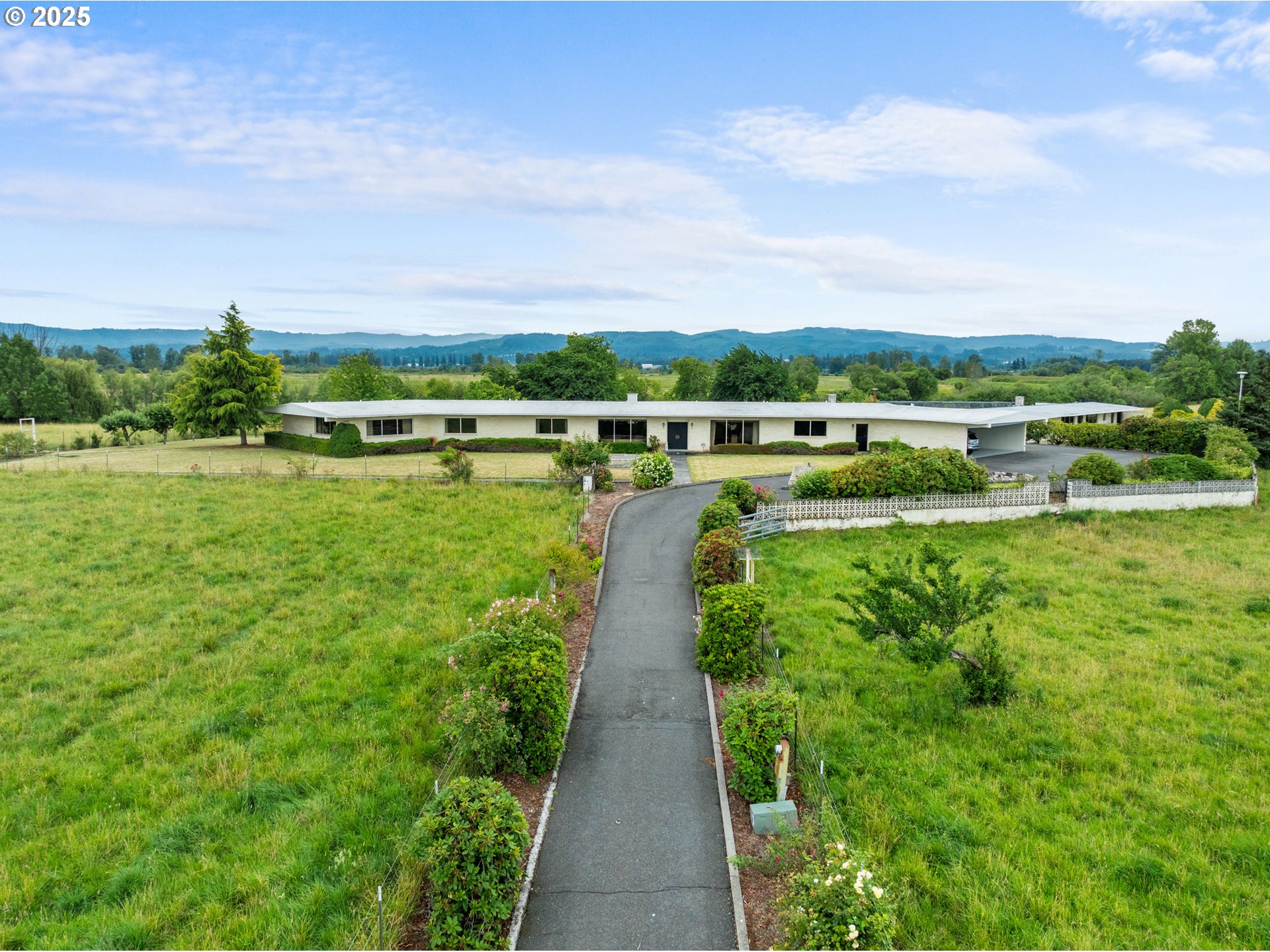 53767 East Honeyman Road Scappoose, OR 97056 - Photo 41 of 46 a view of a lake with a city