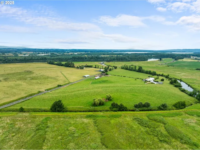 a view of a golf course with a building