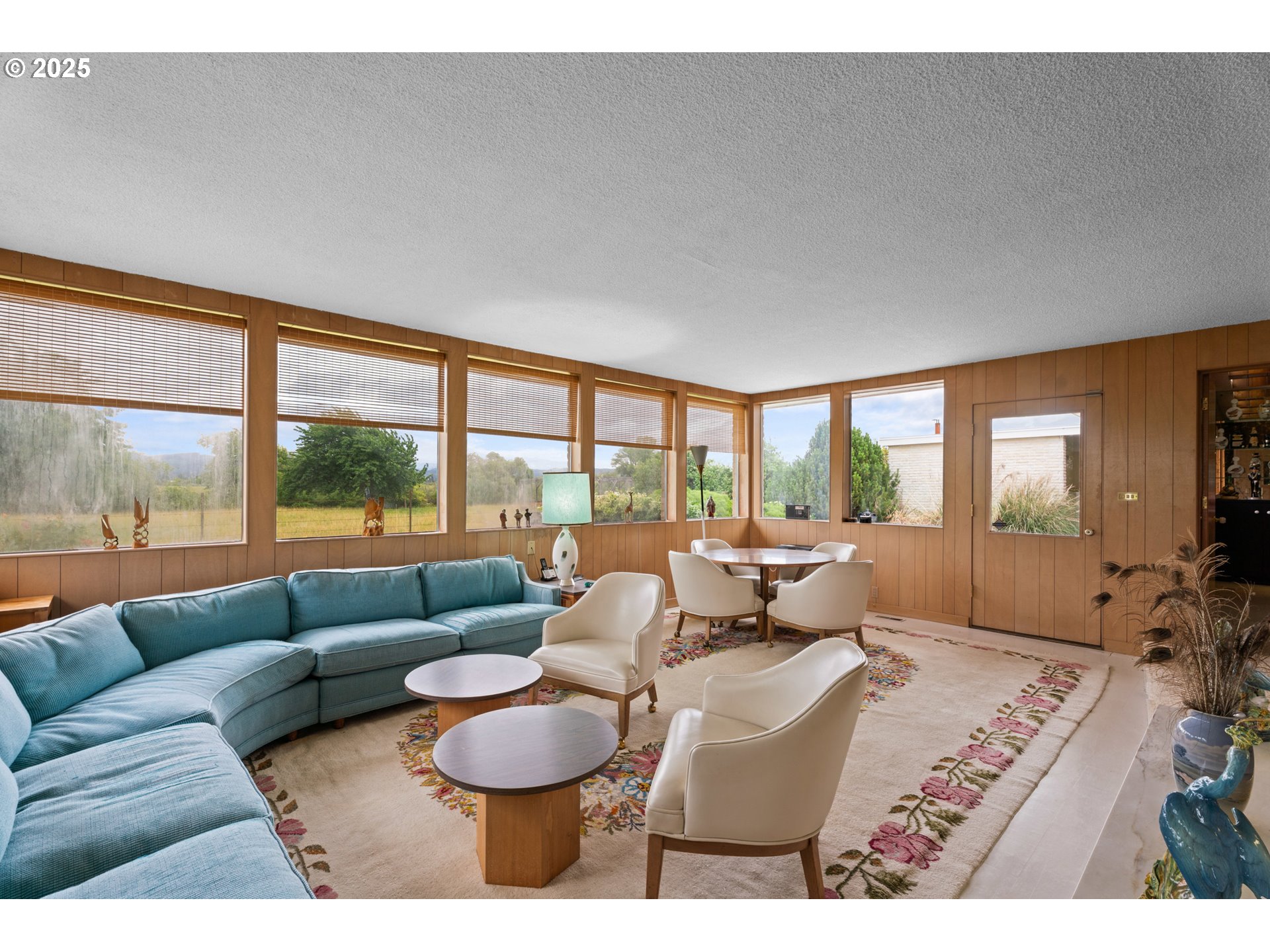 53767 East Honeyman Road Scappoose, OR 97056 - Photo 8 of 46 a living room with furniture and a large window
