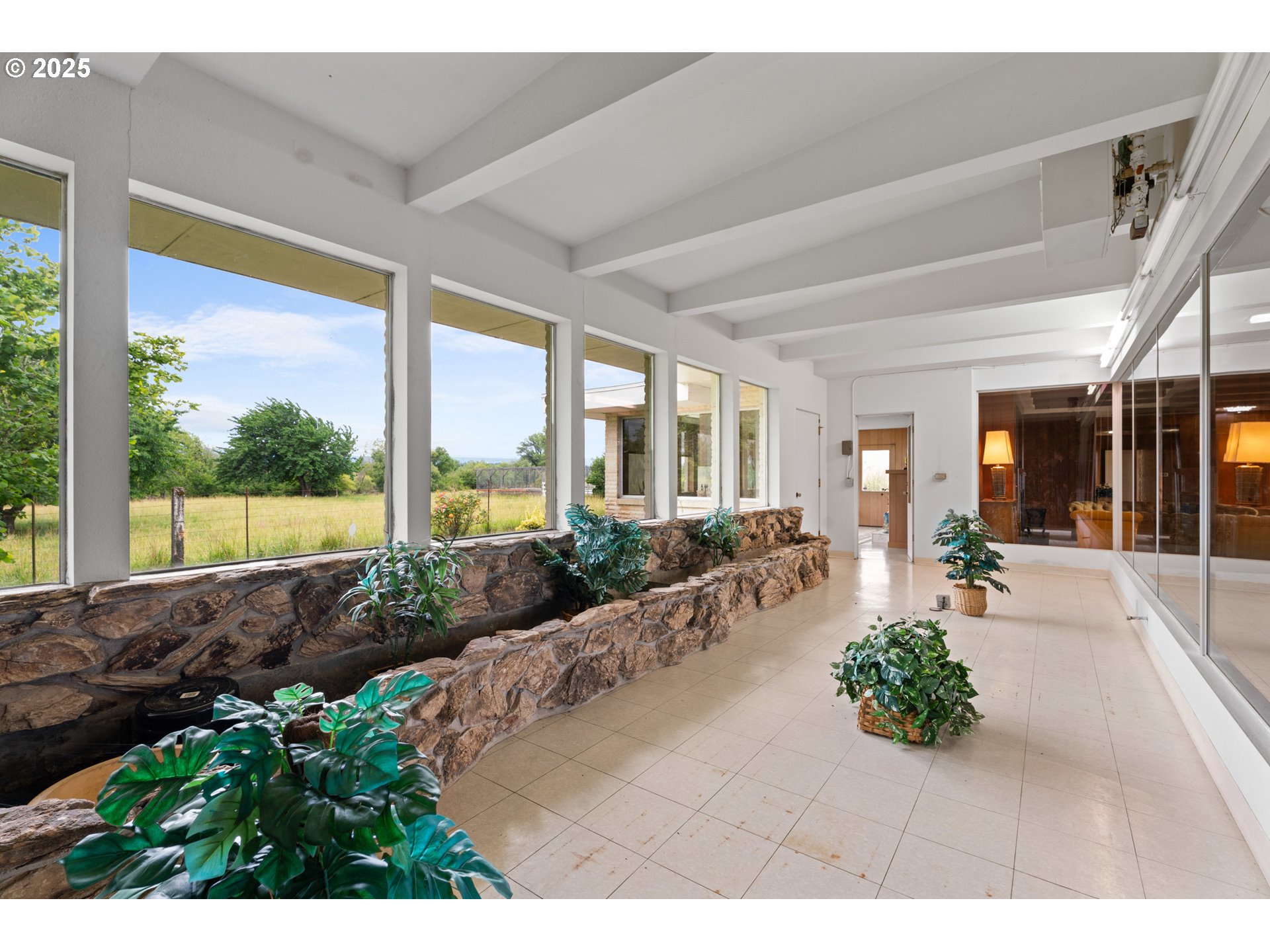 53767 East Honeyman Road Scappoose, OR 97056 - Photo 10 of 46 a living room with furniture and a large window