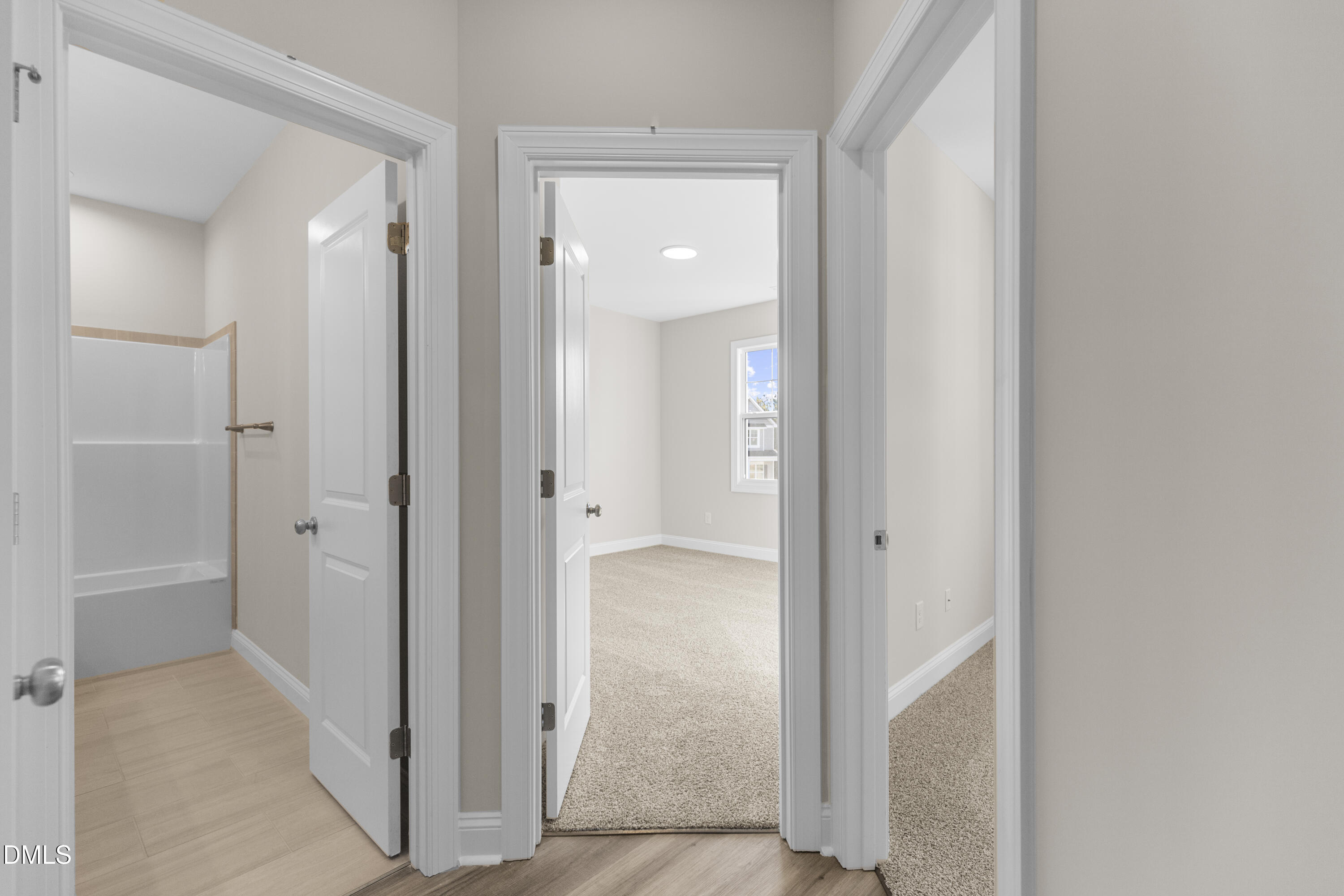 171 Surles Landing Way Benson, NC 27504 - Photo 21 of 29 a view of a bathroom with a glass door shower