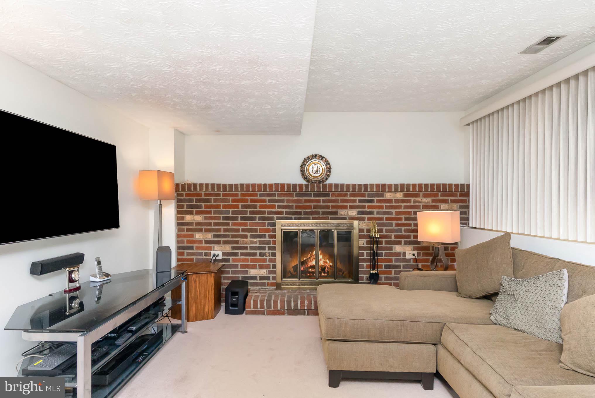 6809 Fordcrest Road Rosedale, MD 21237 - Photo 19 of 30 family room with fireplace