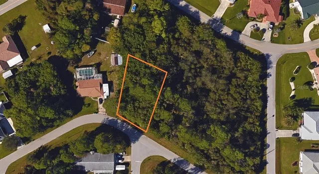 a view of a backyard with a garden