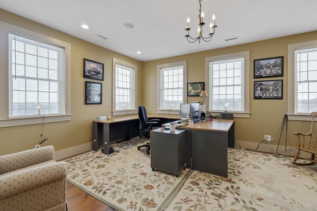 35 Piasta Road Dudley, MA 01571 - Photo 26 of 42 a living room with furniture windows and a flat screen tv