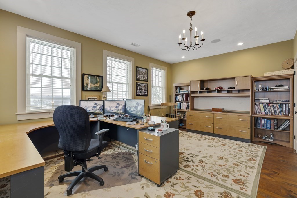 35 Piasta Road Dudley, MA 01571 - Photo 27 of 42 a view of a workspace with furniture and a workspace