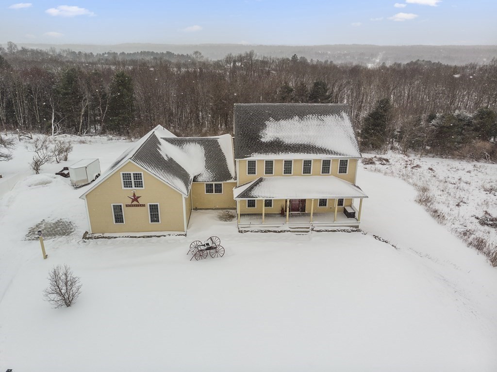 35 Piasta Road Dudley, MA 01571 - Photo 3 of 42 an aerial view of a house with a yard
