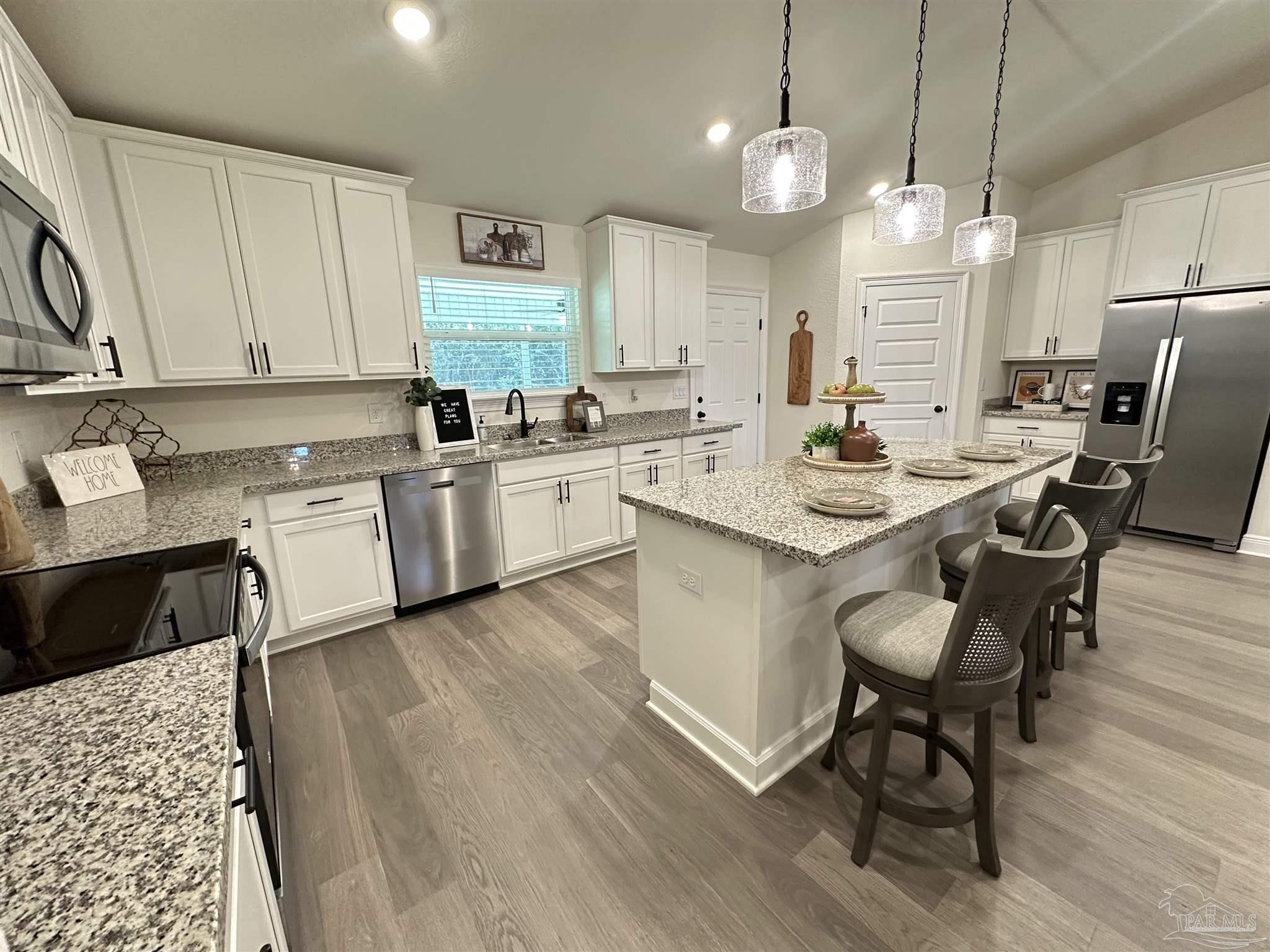 5255 Wahoo Road Milton, FL 32583 - Photo 8 of 26 Pics of Model Home. Colors and Features will vary