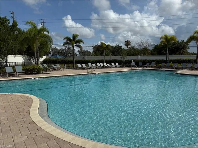 a view of a swimming pool with a garden