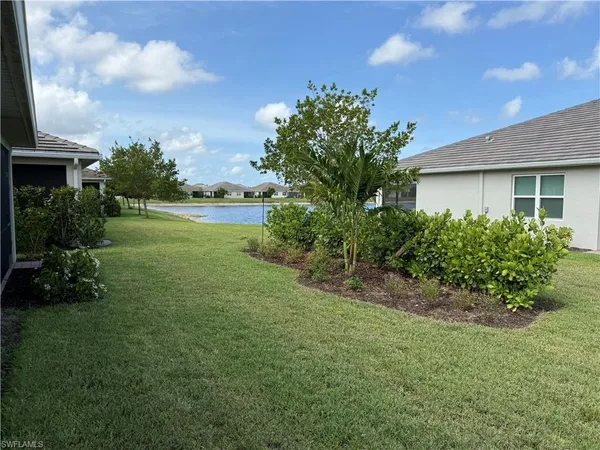 a view of a house with a garden