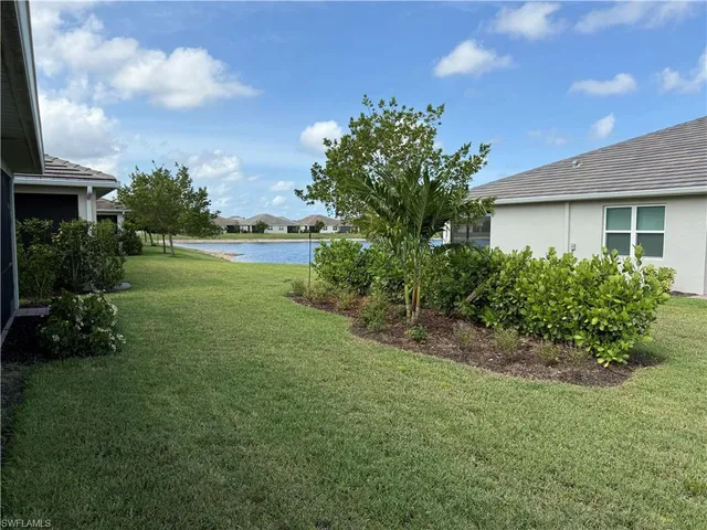 a view of a house with a garden