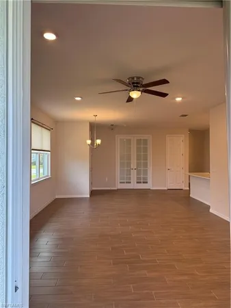 a view of a window in an empty room