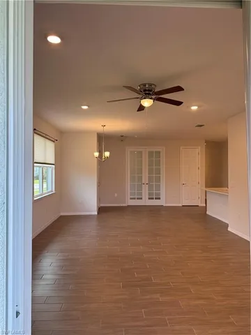 a view of a window in an empty room
