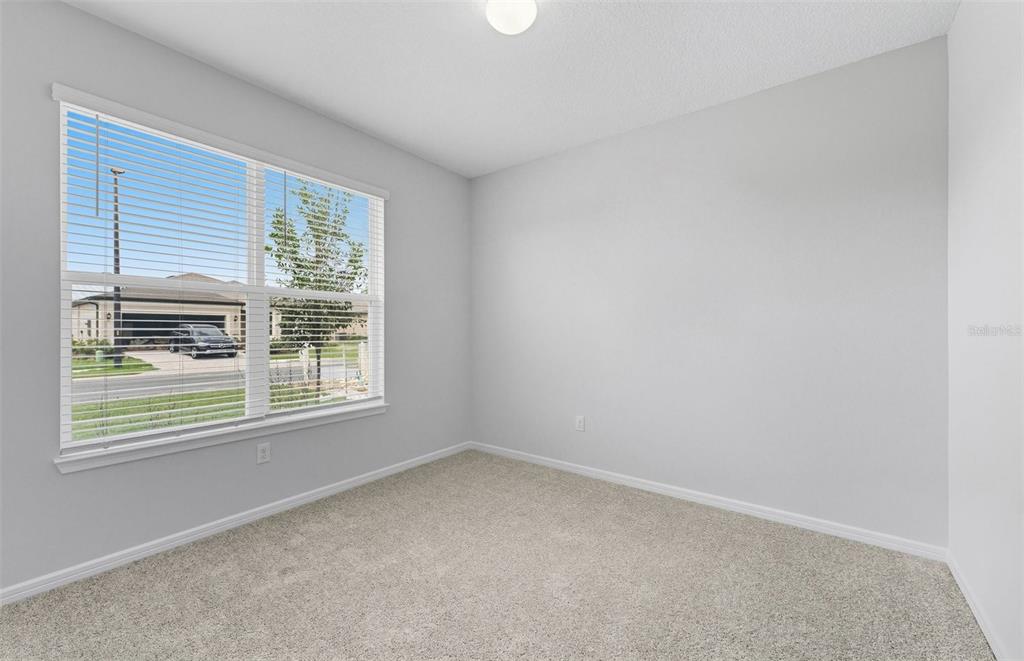 8343 Southwest 58 Loop Ocala, FL 34481 - Photo 12 of 34 an empty room with a window