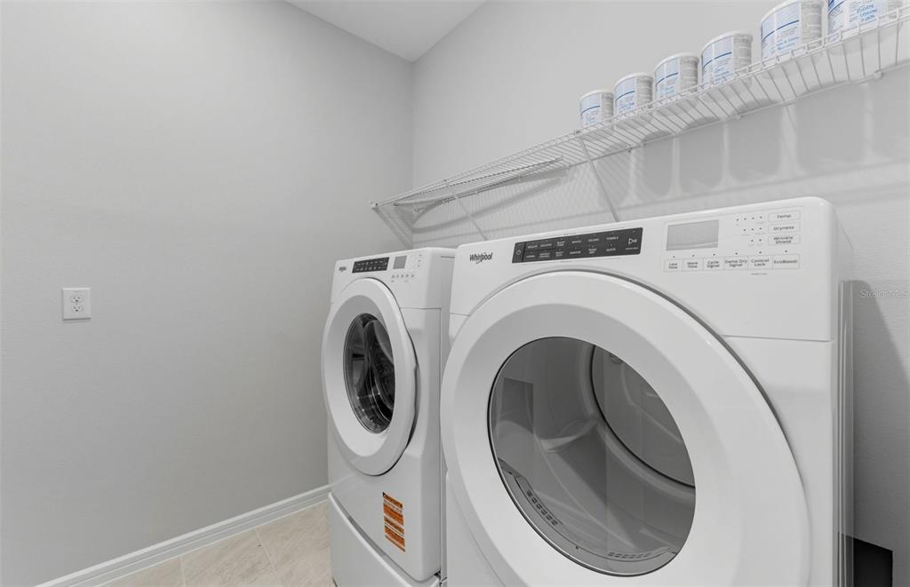 8343 Southwest 58 Loop Ocala, FL 34481 - Photo 14 of 34 a utility room with dryer and washer