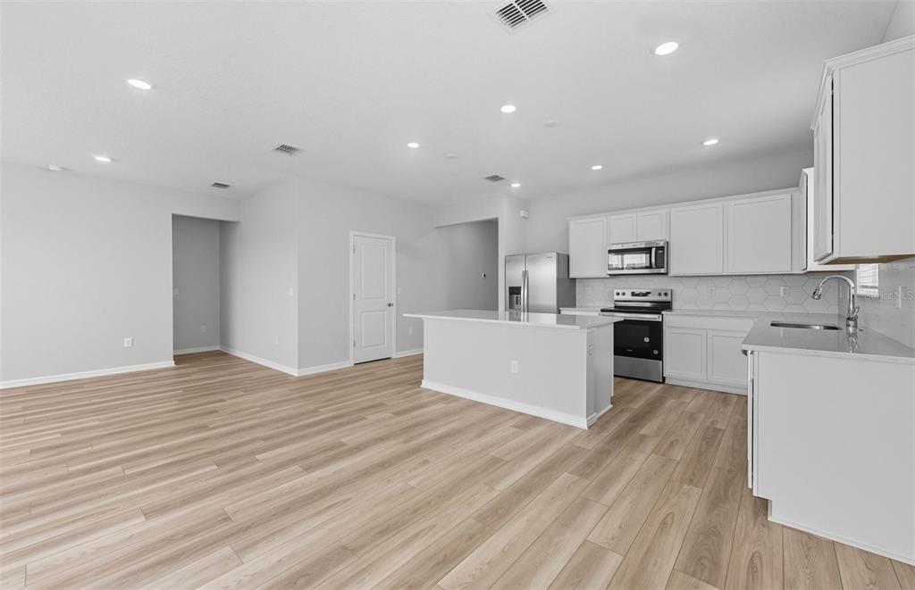 8343 Southwest 58 Loop Ocala, FL 34481 - Photo 5 of 34 a view of kitchen with wooden floor