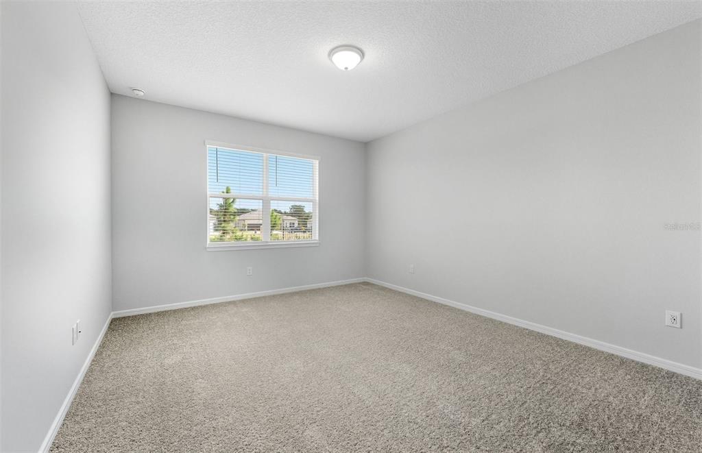 8343 Southwest 58 Loop Ocala, FL 34481 - Photo 7 of 34 an empty room with a window