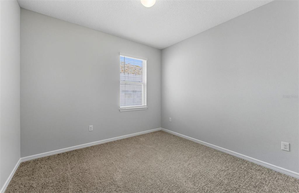 8343 Southwest 58 Loop Ocala, FL 34481 - Photo 10 of 34 an empty room with a window