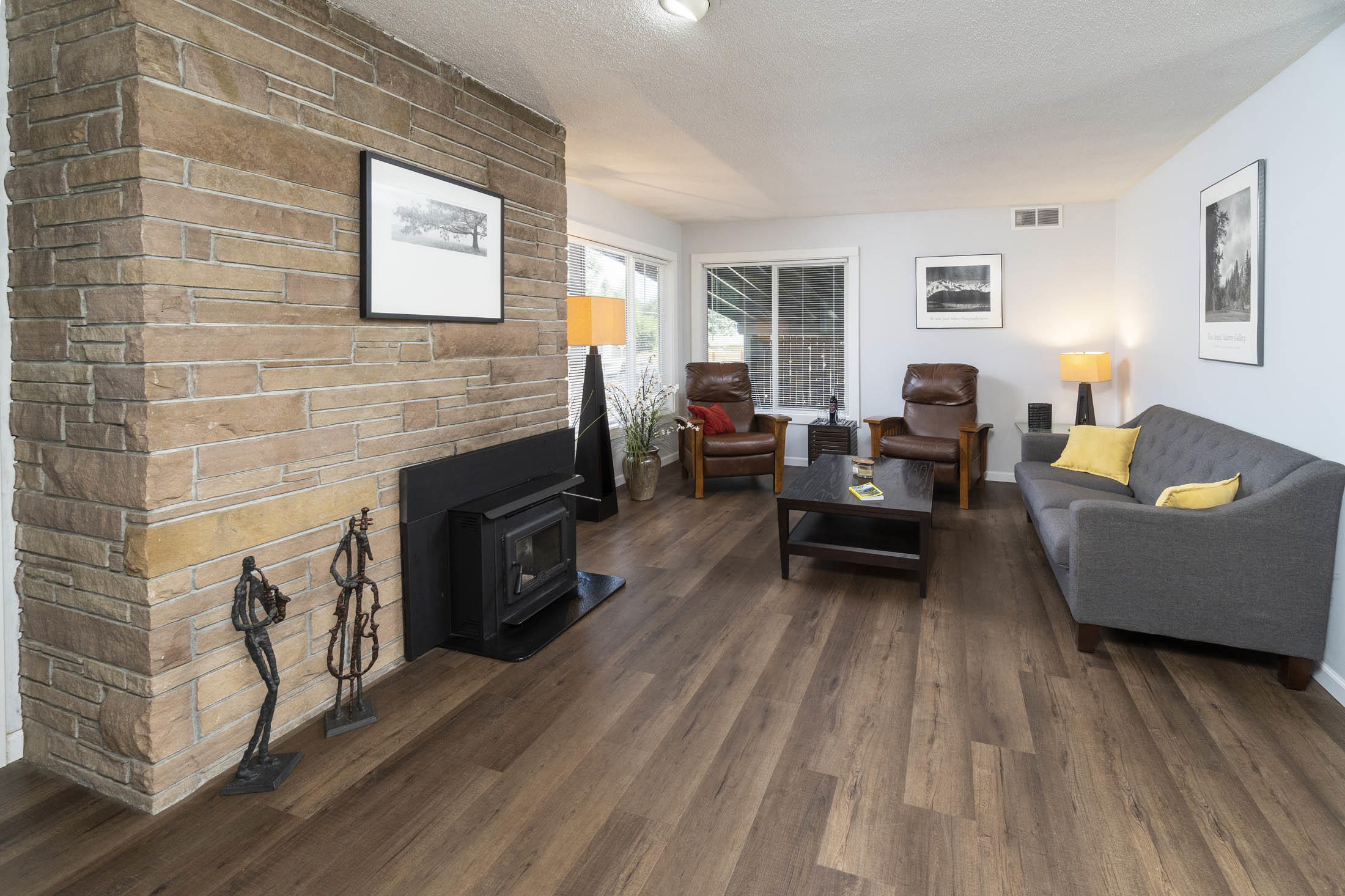 61139 Parrell Road Bend, OR 97702 - Photo 2 of 16 Sun filled Living room with NEW: windows, flooring and interior pain
