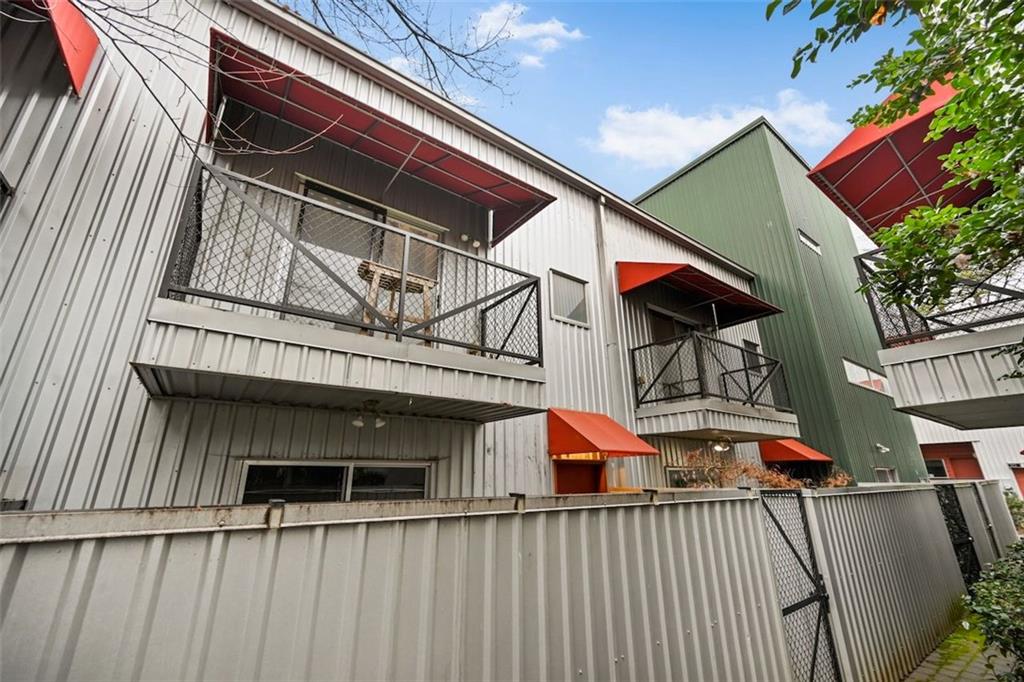 920 Memorial Drive Southeast, Unit 36 Atlanta, GA 30316 - Photo 21 of 36 a view of a house with wooden deck