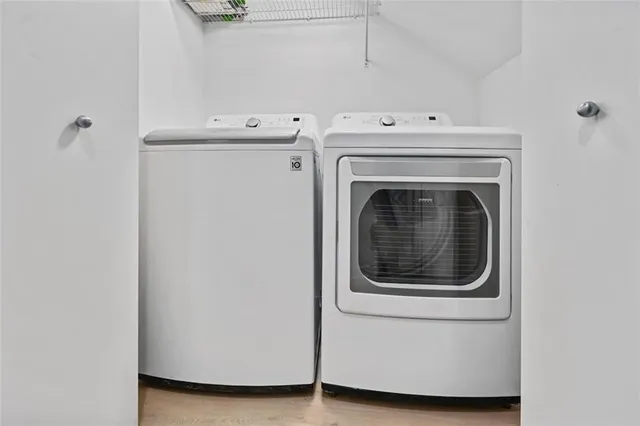 a utility room with dryer and washer
