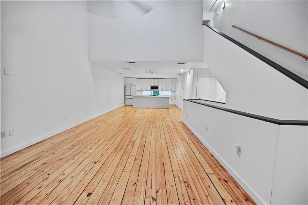 920 Memorial Drive Southeast, Unit 36 Atlanta, GA 30316 - Photo 7 of 36 a view of a room with wooden floor