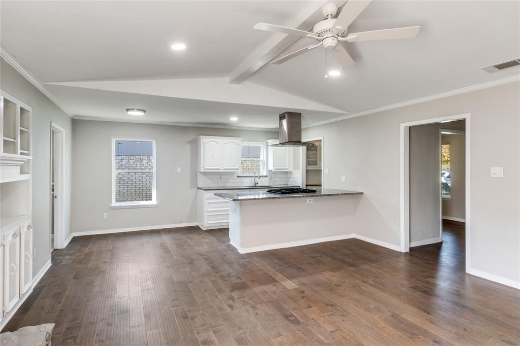 11236 Quail Run Street Dallas, TX 75238 - Photo 16 of 25 a view of kitchen with stainless steel appliances refrigerator oven and stove