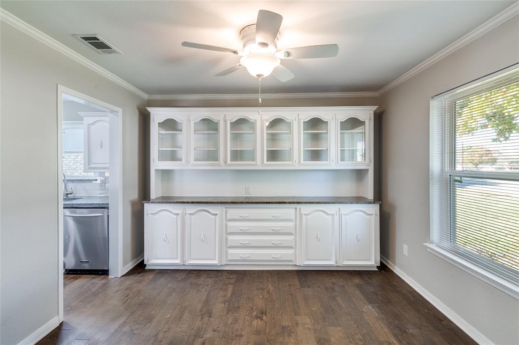 11236 Quail Run Street Dallas, TX 75238 - Photo 7 of 25 a view of an empty room with a window