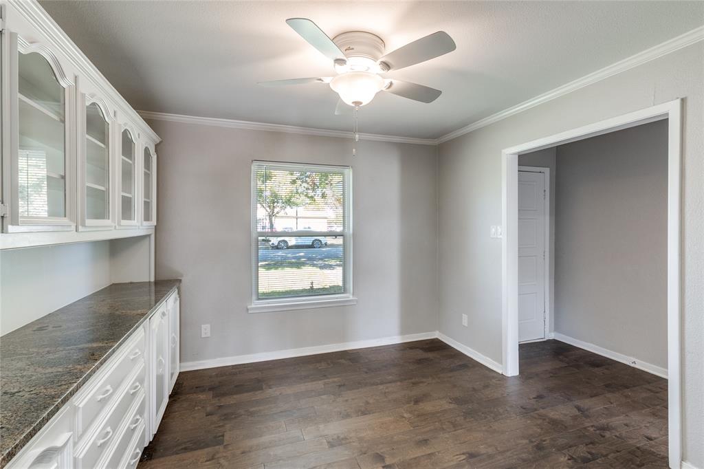 11236 Quail Run Street Dallas, TX 75238 - Photo 8 of 25 a view of an empty room with a window