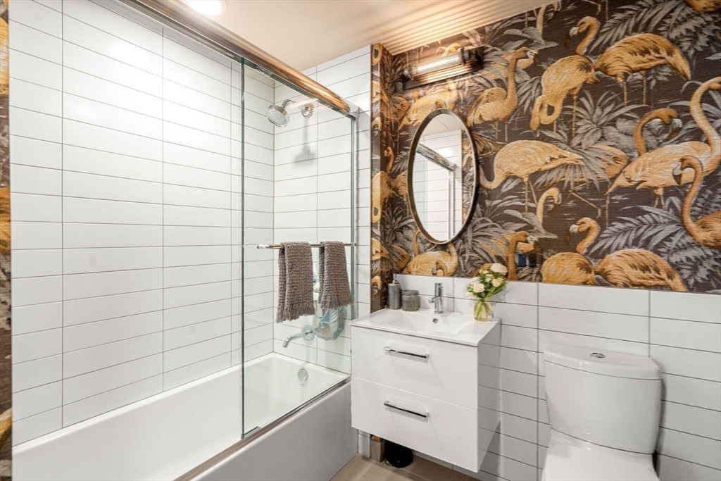 7 East Springfield Street, Unit 6 Boston, MA 02118 - Photo 31 of 42 a bathroom with a sink and a mirror