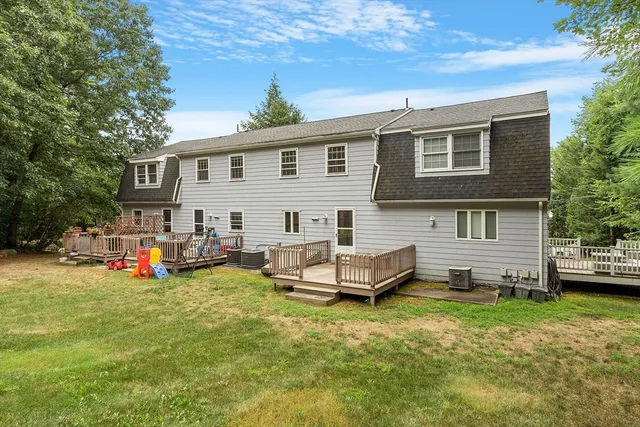 a view of a house with sitting area and furniture