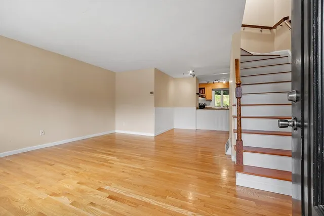 a view of a hallway view with staircase