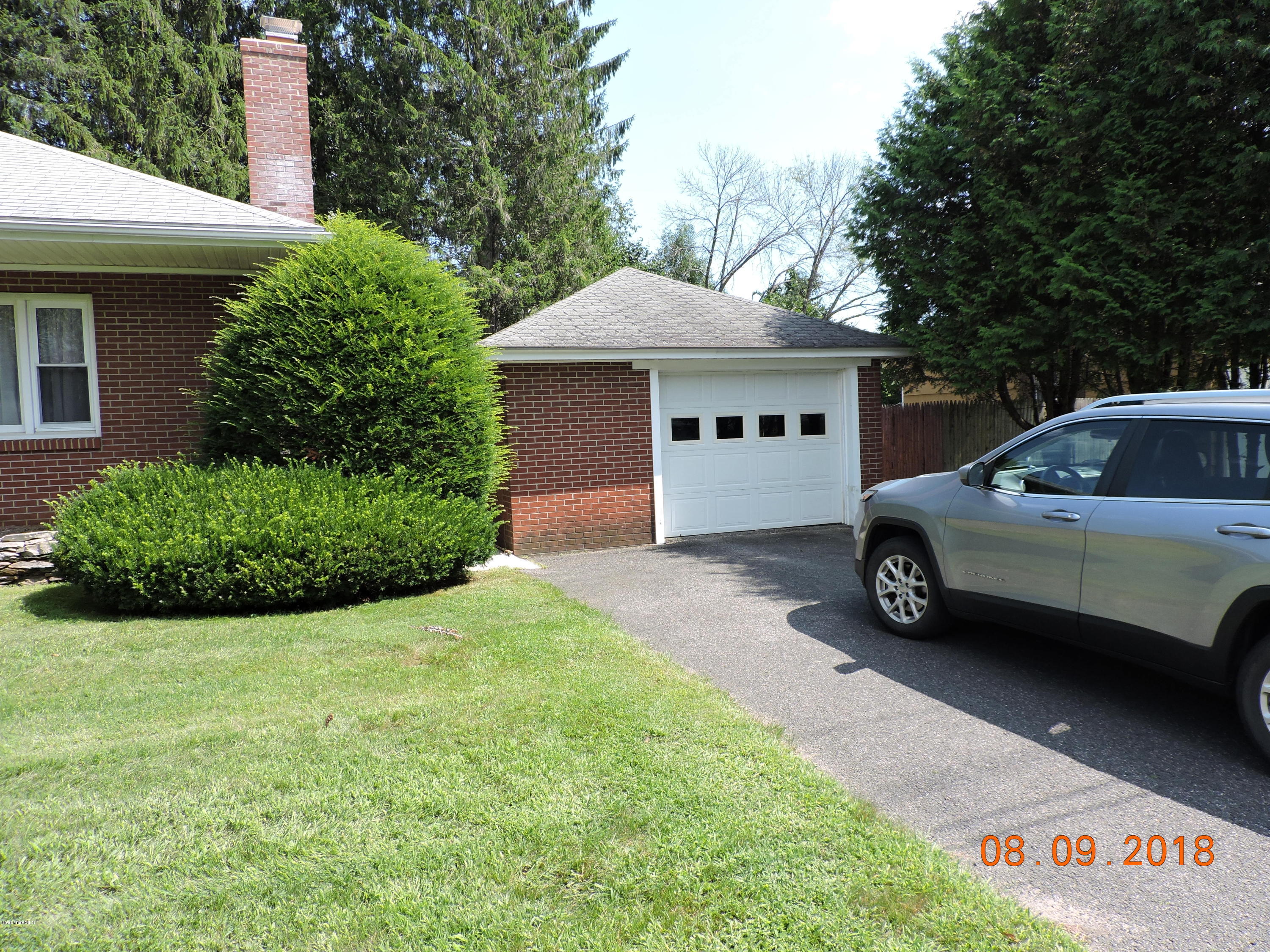 14 Calumet Street Pittsfield, MA 01201 - Photo 2 of 26 a house view with a garden space