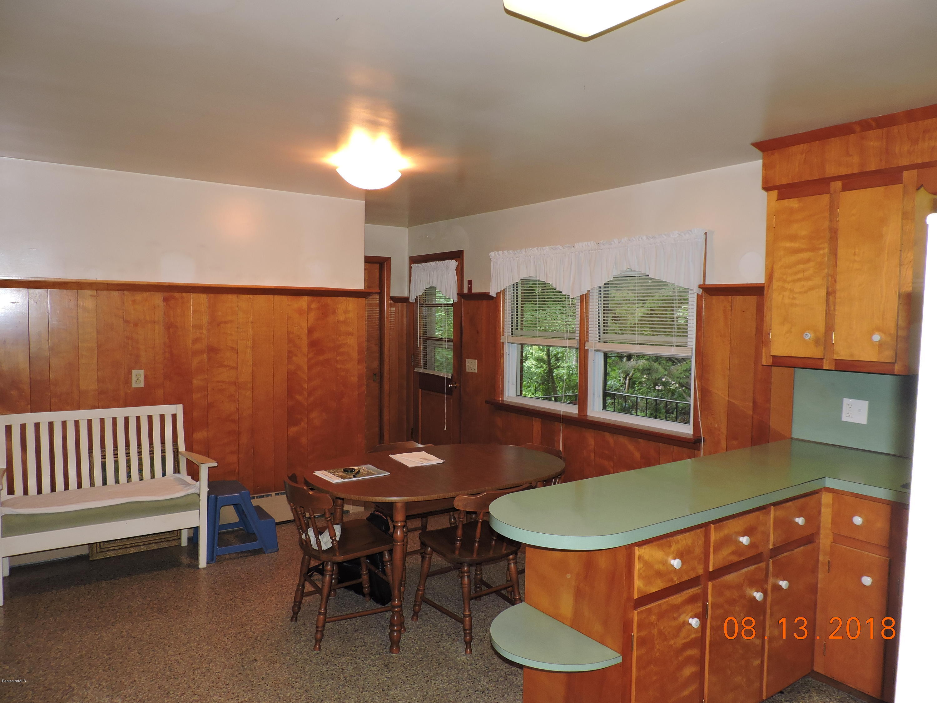 14 Calumet Street Pittsfield, MA 01201 - Photo 11 of 26 a view of a dining room with furniture window and outside view
