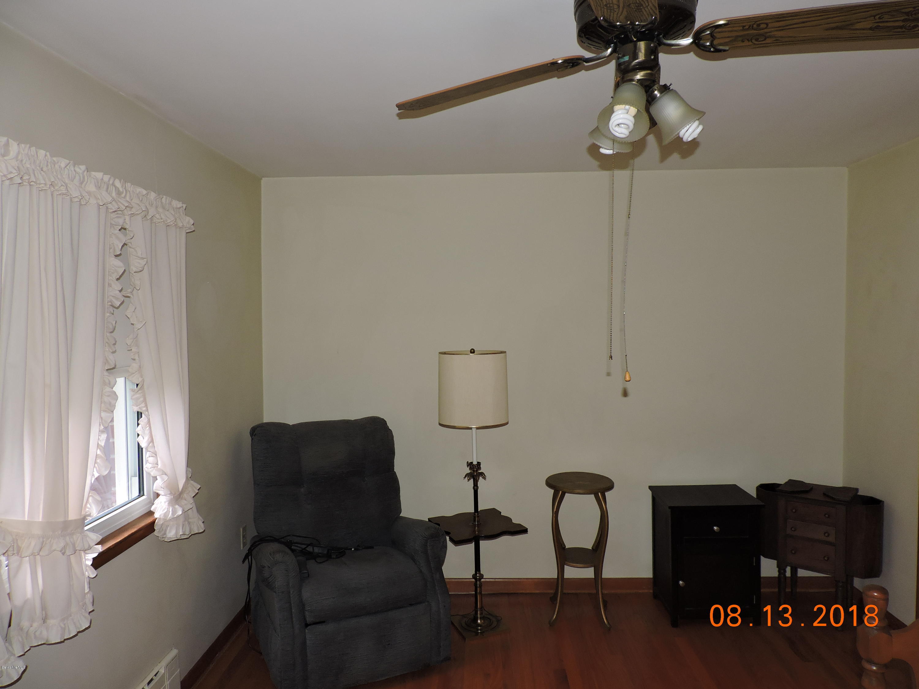 14 Calumet Street Pittsfield, MA 01201 - Photo 15 of 26 a view of a workspace with furniture and a window