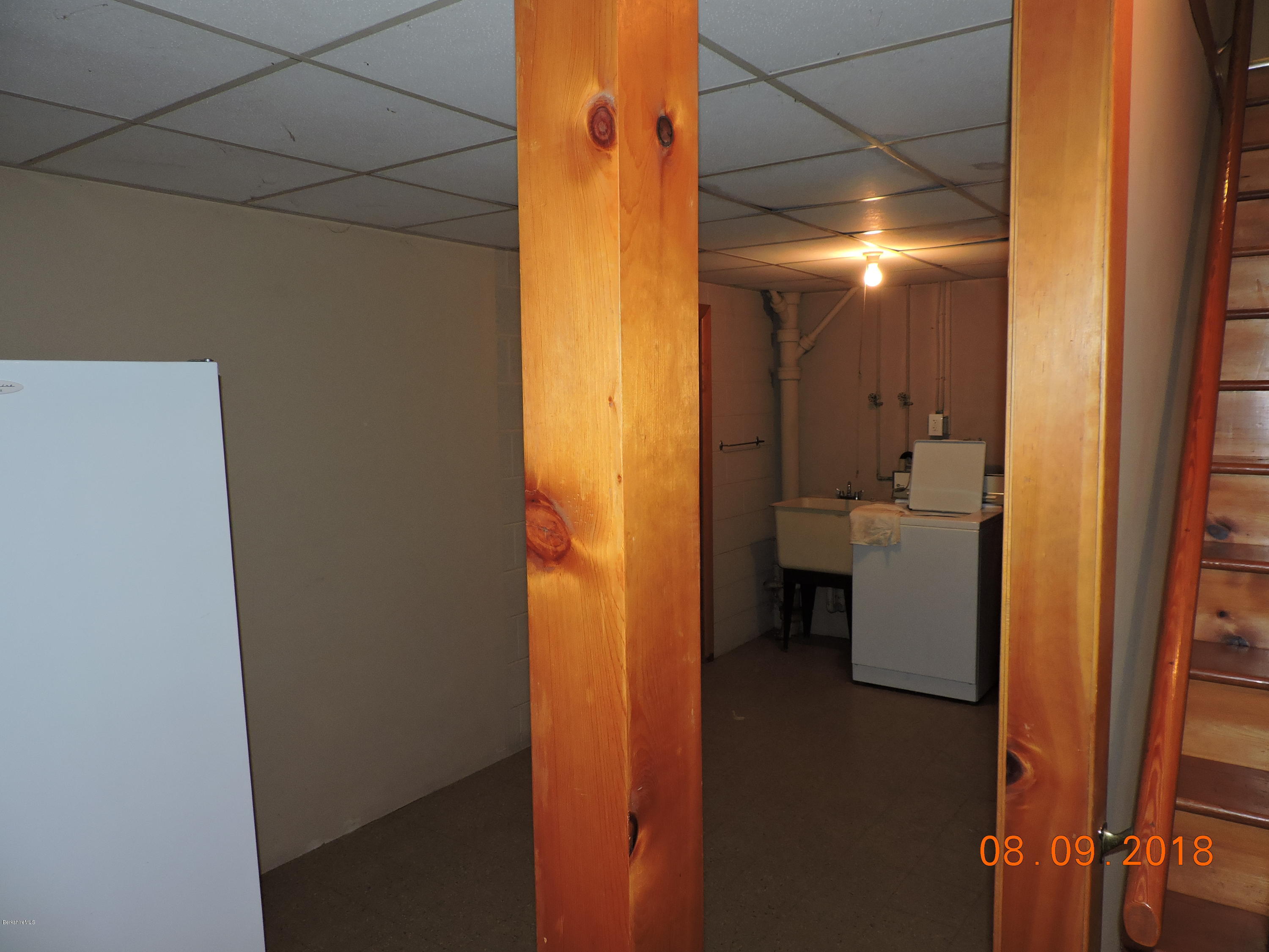 14 Calumet Street Pittsfield, MA 01201 - Photo 21 of 26 a bathroom with a sink and a mirror