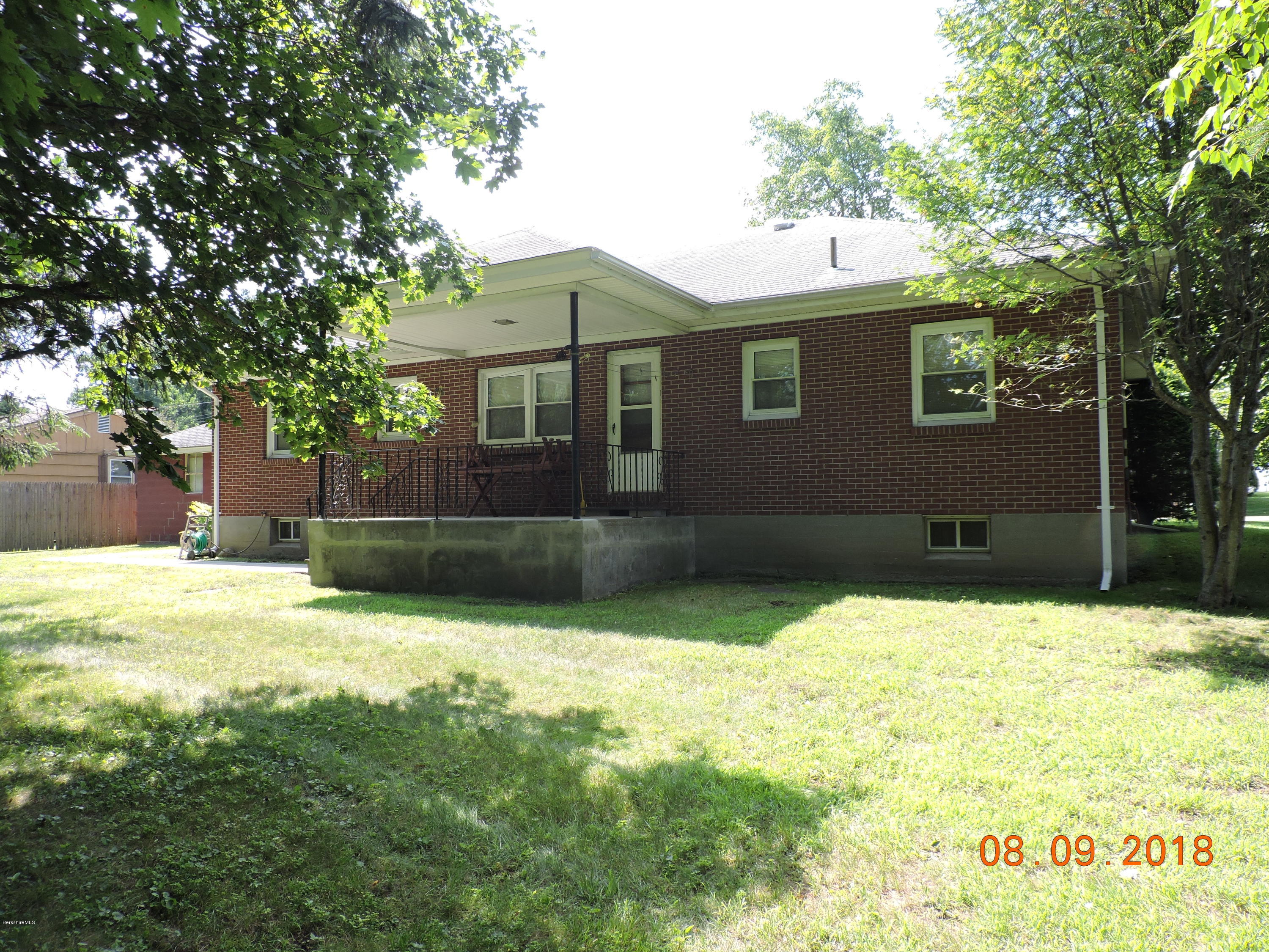 14 Calumet Street Pittsfield, MA 01201 - Photo 4 of 26 a house with a yard